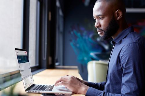 Laptop user browsing IBKR campus